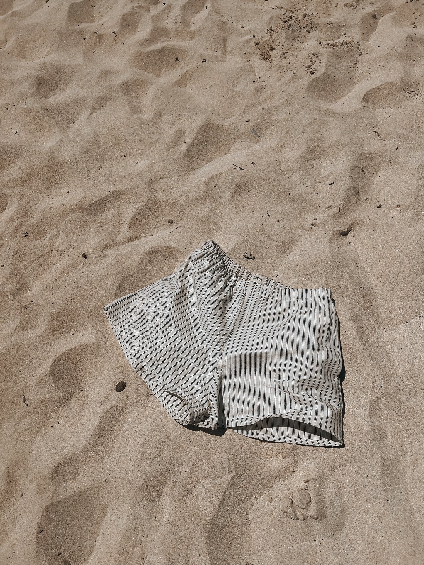 Shorts de lino rayas negras