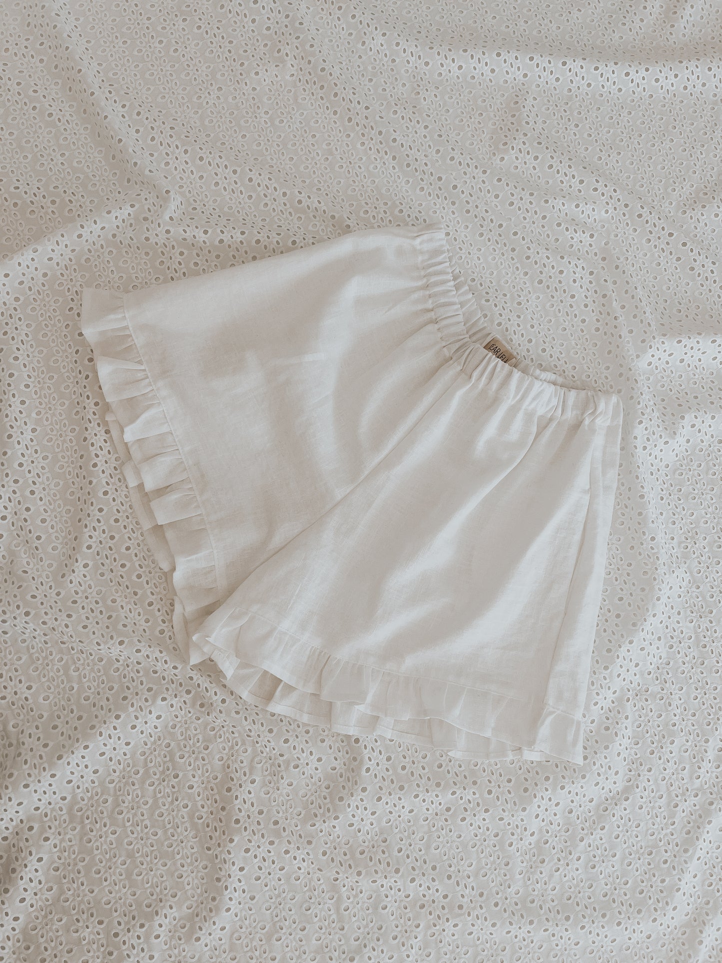 White linen ruffled shorts